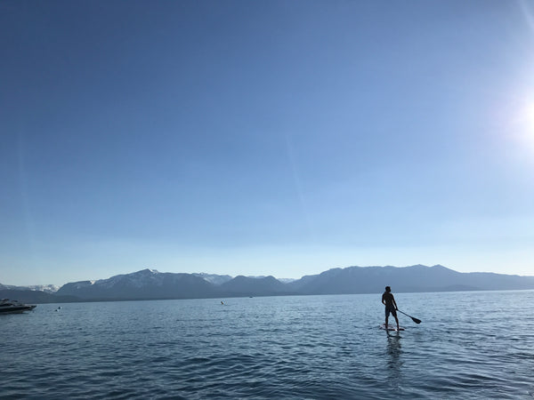 Using a camera strap and sunglass strap at these epic paddle boarding spots. 