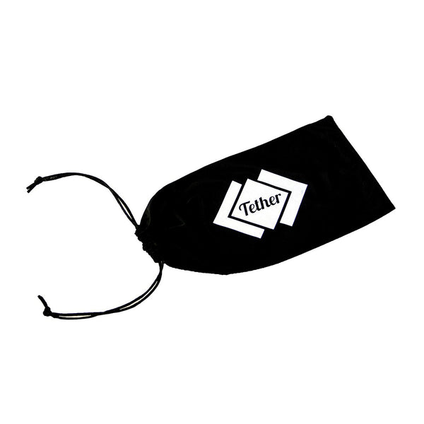Black drawstring bag , tether straps